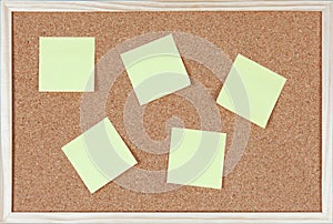 Six post-it notes sticked on corkboard