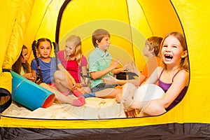 Six pretty kids in a tent