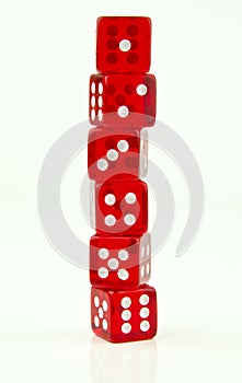 Six red dice stacked up