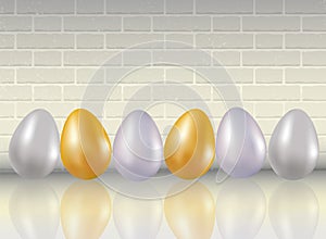 A six shining dyed in metallic gold, silve, platinum colors chicken eggs on white brick wall background with reflaction. Healthy f