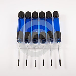Six small blue screwdrivers