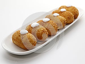 Six spanish croquettes with mayonnaise. Typical Tapa of Spanish Cuisine