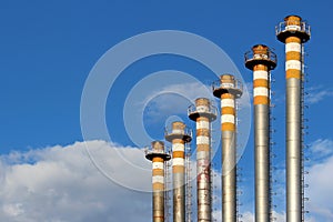 Six of steel chimney and blue sky