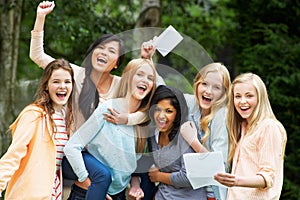 Six Teenage Girls Celebrating Successful Exam Results