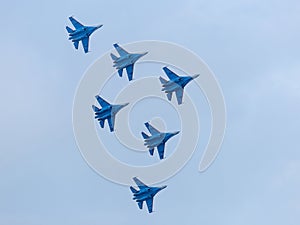 Six war jet planes in sky