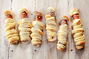 Six Weiners Wrapped in Pastry to Look Like Mummies