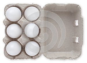 six white eggs in box cardboard, top view isolated on white background. Template for Happy Easter, copy space for advertising
