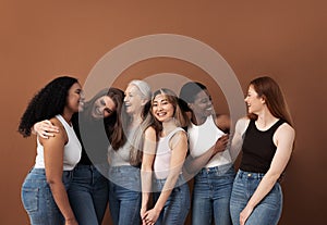 Six women of different ages and ethnicities having fun together