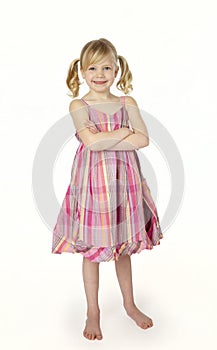 Six Year Old Girl Standing on White Background photo