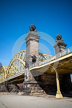Sixteenth Street Bridge, Strip District, Pittsburgh, from beneath with clear blue sky photo