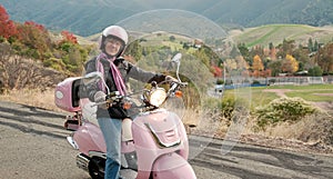 Sixty year old biker cruising down a hillside