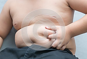 The size of stomach of children with overweight.