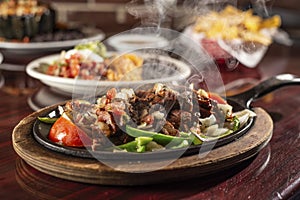 Sizzling beef fajita platter photo