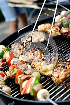 Sizzling chicken and kebabs photo