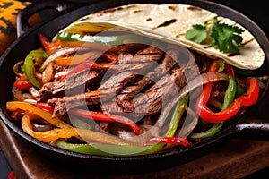 Sizzling fajitas on a cast iron skillet with vibrant peppers and onions, ready to be wrapped in a warm tortilla