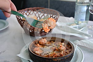 Sizzling prawns with garlic. Traditional Spanish tapas dish.