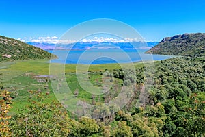 Skadar Lake the largest lake in the Balkans. Surroundings, mountains, coastline, swamps.