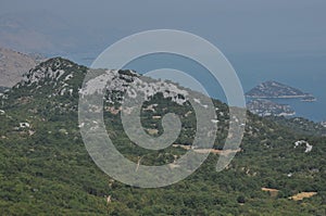 Skadar Lake in Montenegro. The open surface of the lake with the richness of nature and mountains. Boat cruises on the lake