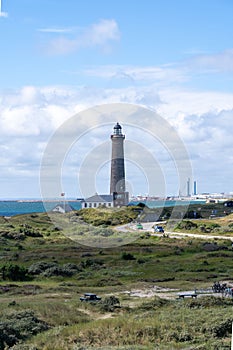 Skagen lighthouse standing proudly on a beach in Denmark.