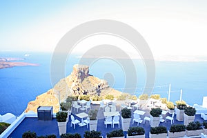 Skaros rock in Santorini against blue sea as a