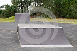 Skateboard jumps in skate park outdoor city