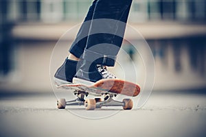 Skateboard man practices to ride on asphalt, learns tricks