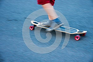 Skateboard in motion, selective focus