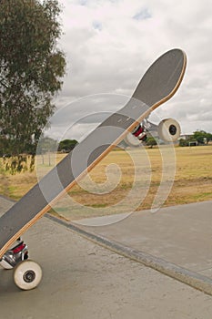 Skateboard at ramp edge