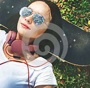 Skateboard Relaxation Rest Lying Chill Headphone Concept photo