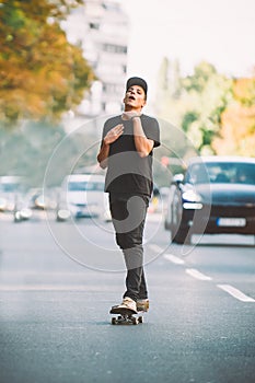 The skateboard rider on the street exhausted of riding skate