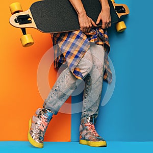 Skateboard Style fashion Girl. Minimal Design. Skateboard and denim