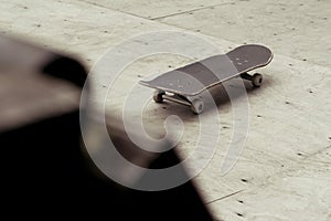 Lonely Skate on am wooden mini ramp photo