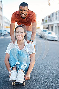 Skateboard, young couple and fun, street style and playful sport date in urban cityscape. Gen Z fashion, man and woman