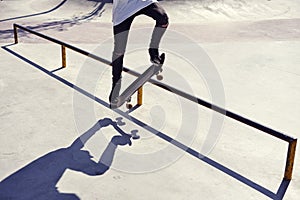 Skateboarder doing a trick in a skate park, practice freestyle e