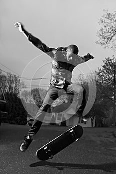 Skateboarder Doing Tricks photo