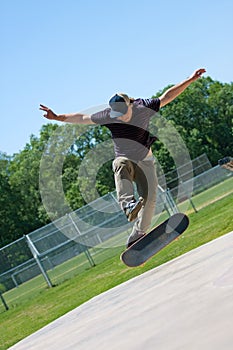 Skateboarder Doing Tricks On His