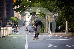 Skateboarder on empty streets in NYC
