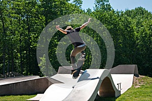 Skateboarder Jumping Skate Ramp