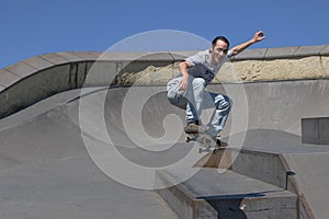Skateboarder jumping towards the camera