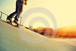 Skateboarder skateboarding at city