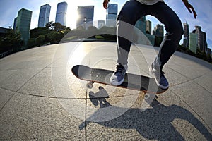 Skateboarder skateboarding at city