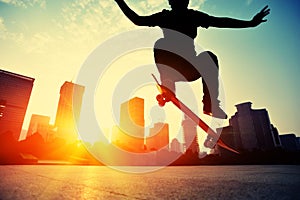 Skateboarder skateboarding at city photo
