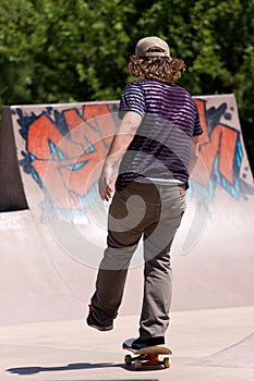 Skateboarder Skating at a Skate Park