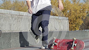 Skateboarder try grind trick on ledge and skate nose jumps off the edge