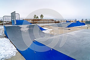 Skateboarding ramps on a skate park in winter