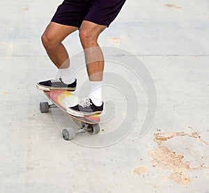 Skateboarding on road surface with dirt and sand. Can cause an accident to slip and fall