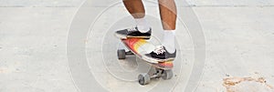 Skateboarding on road surface with dirt and sand. Can cause an accident to slip and fall