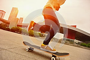 Skateboarding woman in the city