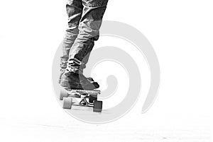 Skater boy speed with longboard
