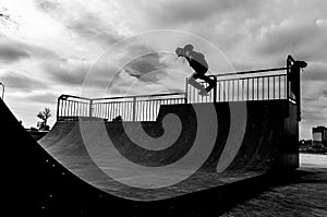 Skater doing trick in the rampa